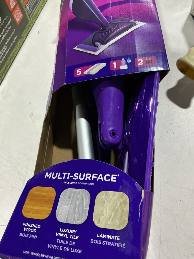 Condition photo showing As Is for swiffer wetjet 11 in. w wet mop kit