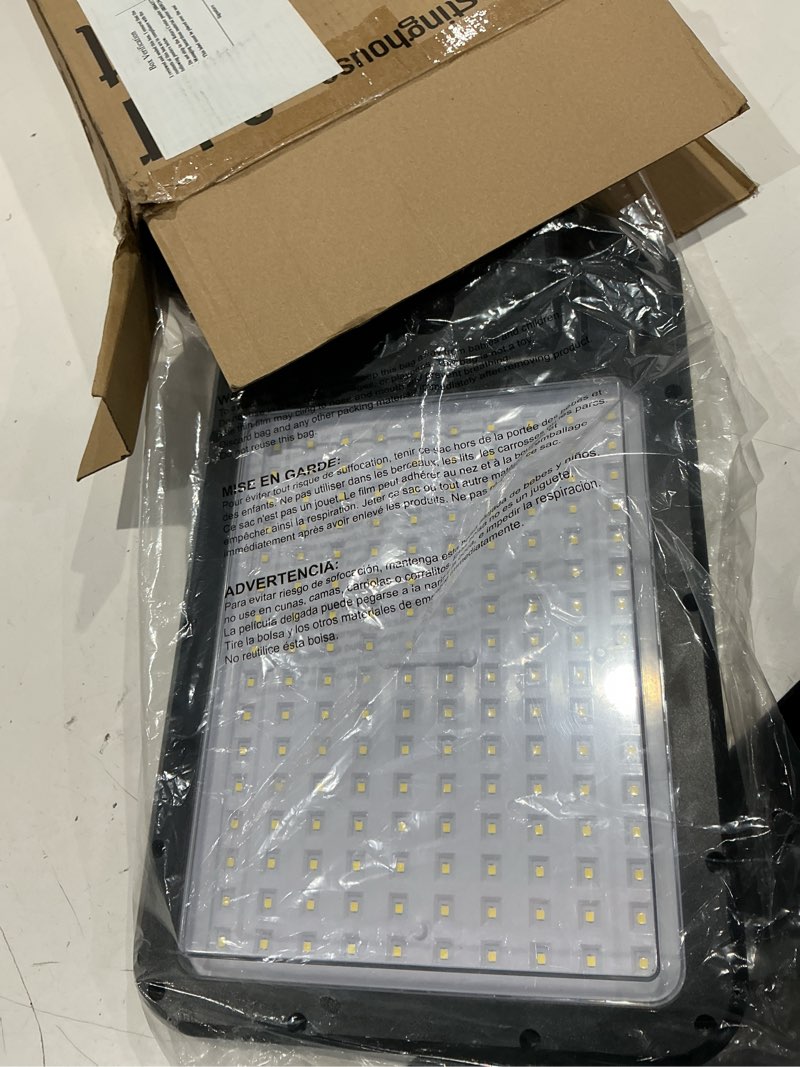 Condition photo showing Good Condition for westinghouse 4000 lumen motion activated solar area light