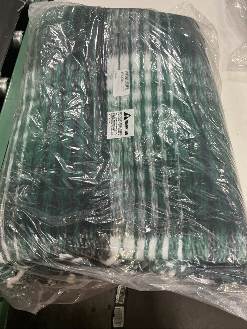Condition photo showing New/Like New for recycled plaid blanket – green