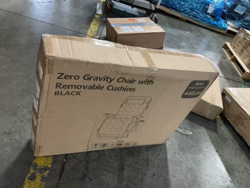 Condition photo showing New/Like New for zero gravity chair with removable cushion black
