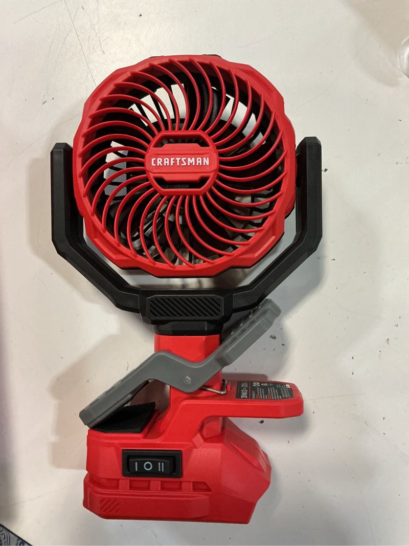 Condition photo showing As Is for craftsman 4-in indoor desk fan, battery powered, in red and black