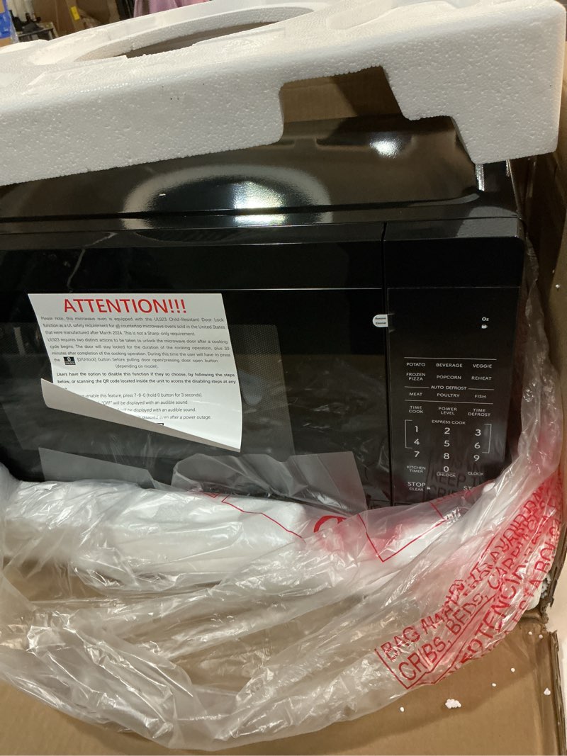 Condition photo showing Good Condition for sharp countertop microwave oven with removable 12.4" carousel turntable, 1000 watt, 1.1 cubic feet, black