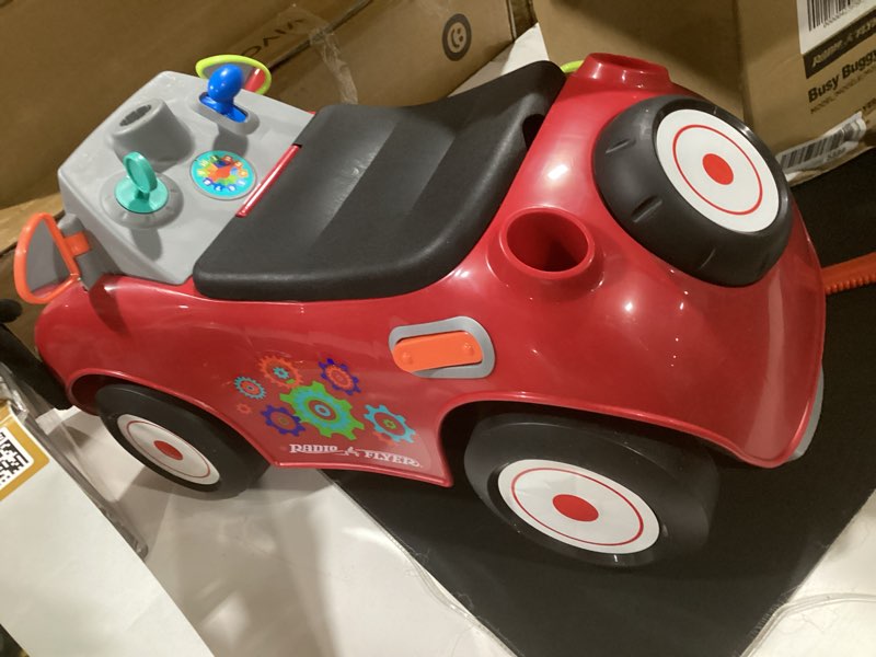 Condition photo showing Good Condition for radio flyer busy buggy, for toddlers 1-3, 3-in-1 push walker ride on car with 17 sensory activities, anti-tip feature, under-seat storage, horn and gears, 42 lb capacity, toddler ride on toys red