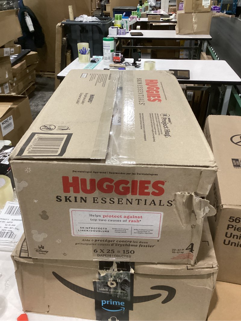 Condition photo showing New/Like New for huggies skin essentials luxury diapers - size 4 - 150ct