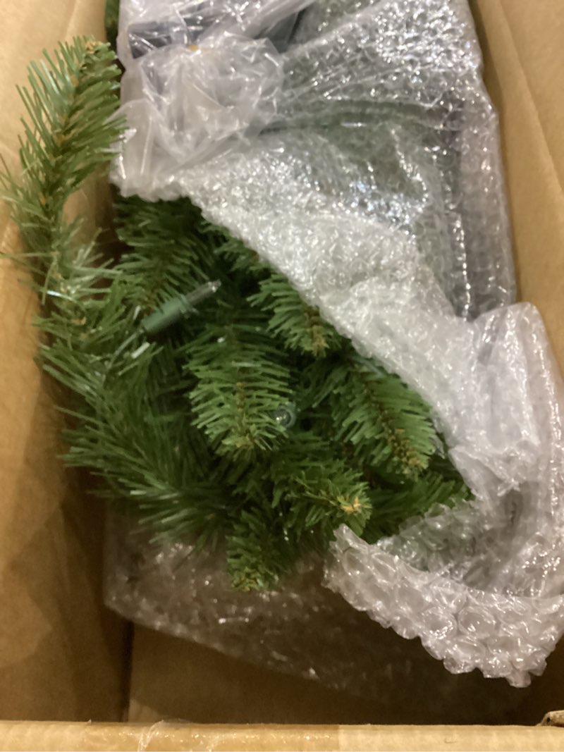Condition photo showing item condition for national tree company artificial pre-lit slim christmas tree  green  kingswood fir  clear lights  includes stand  4.5 feet