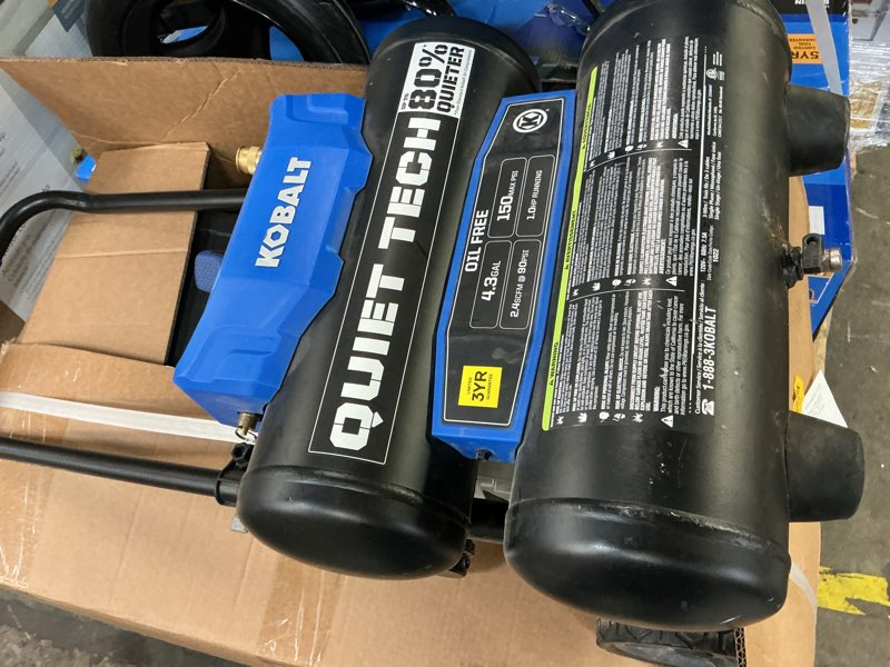 Condition photo showing As Is for kobalt 4.3-gal quiet compressor and 1/4-in x 25-ft pu recoil hose