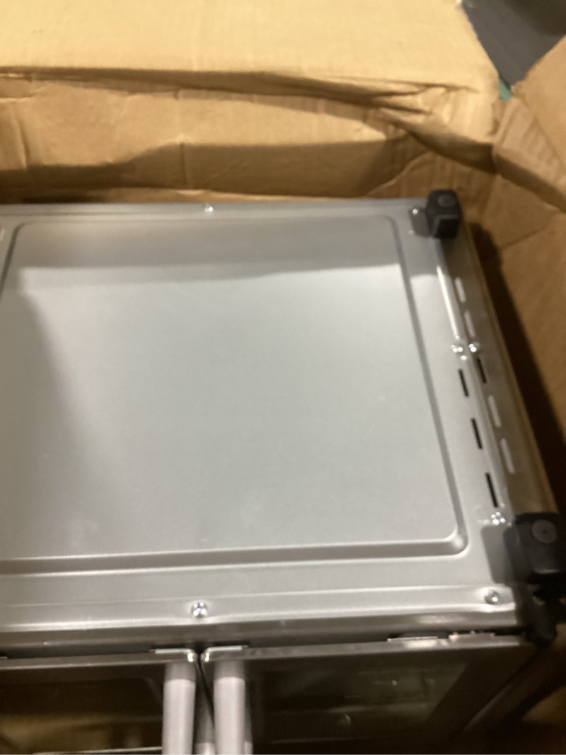Condition photo showing As Is for Emeril Lagasse Extra Large French Door Air Fryer Toaster Oven Combo, 24 Cooking Functions and Digital Controls, 7 Accessories Included, Stainless Steel Finish, 26QT Capacity