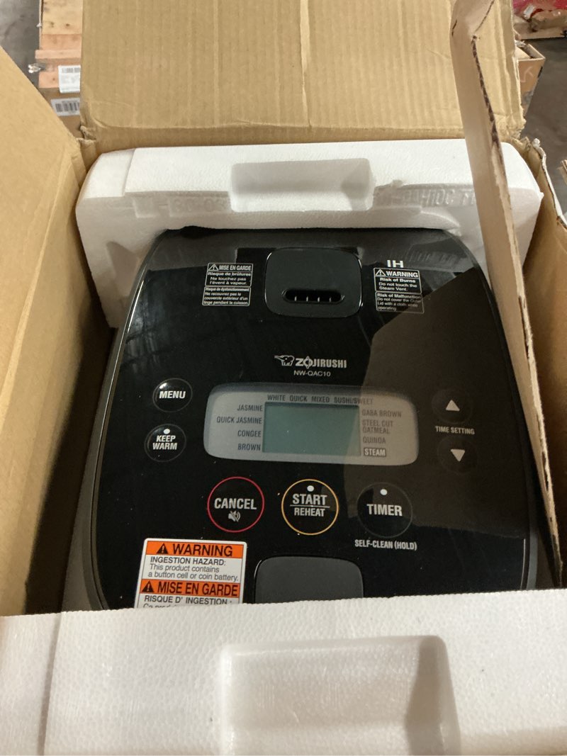 Condition photo showing As Is for Zojirushi NW-QAC10 5.5-Cup Capacity Flat-Top Induction Cooker and Warmer with Custom Cooking Pan, Double Non-Stick Coating for Easy Clean-Up (Black) 9.25 x 12.25 x 7.88 5.5 CUP