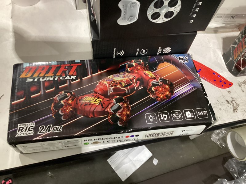 Condition photo showing New/Like New for nikuku remote control car - 2.4ghz 4wd gesture sensing rc stunt car toys for boys and girls ages 6-12, 360° rotating drift rc cars with lights and music, ideal birthday and xmas gift red