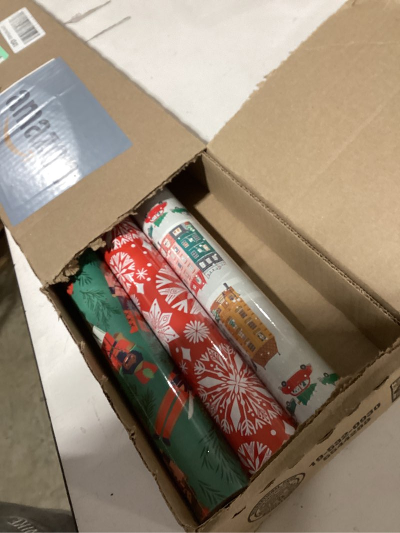 Condition photo showing New/Like New for Hallmark Christmas Wrapping Paper with Cutlines on Reverse (3 Rolls: 120 Sq. Ft. Total) Winter City Scene, Rustic Snowflakes on Red, Nutcrackers with Foliage