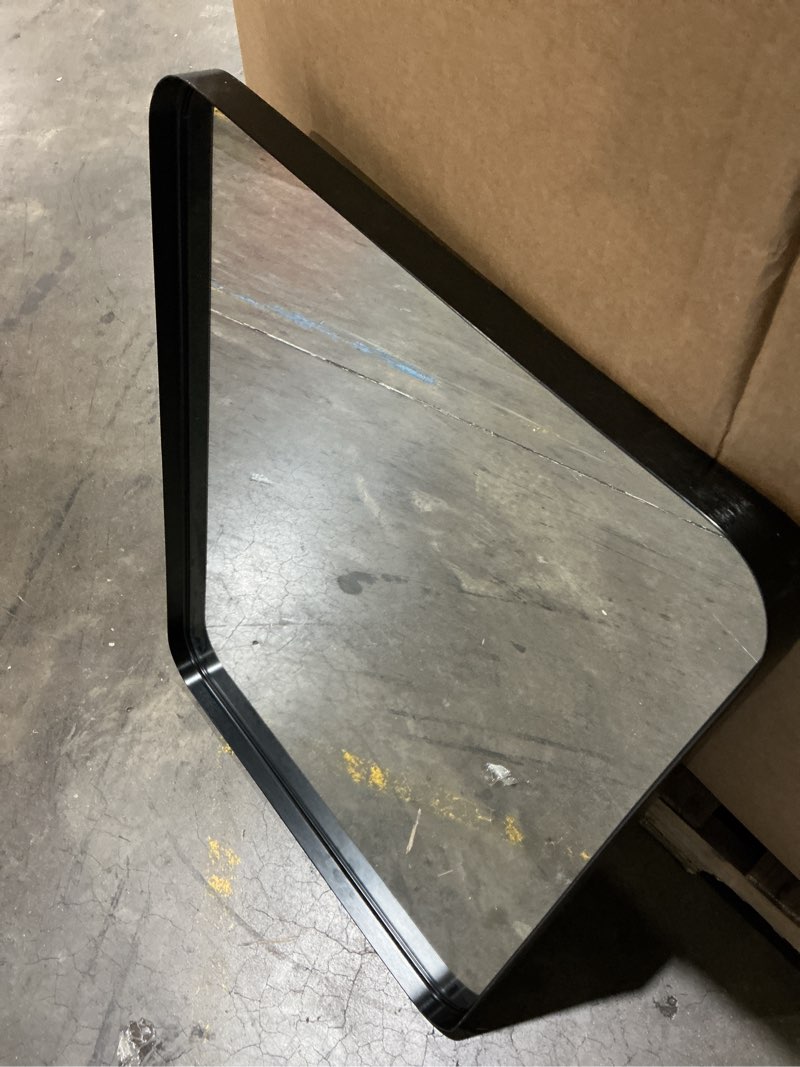 Condition photo showing As Is for rectangular wall mirror with a modern black metal frame with rounded corners