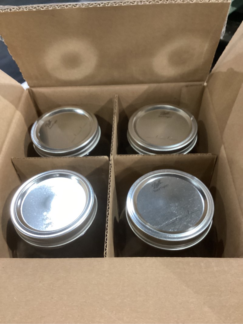 Condition photo showing Good Condition for Ball Wide Mouth Glass Mason Jars with Lids and Bands, Used for Canning, Pickling, Juice, Jam, Jelly, Half Gallon Size 64 Ounce (Pack of 4) Half Gallon 64 Ounce (Pack of 4)