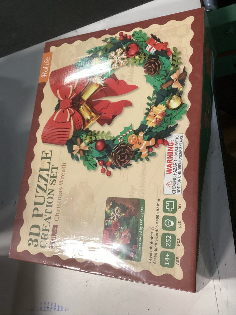 Condition photo showing New/Like New for rolife 3d puzzles for adults christmas wreaths for front door, artificial eucalyptus wreath for all seasons, indoor and outdoor wreath with red bow&golden bell, led for christmas decor (16in, 252pcs)