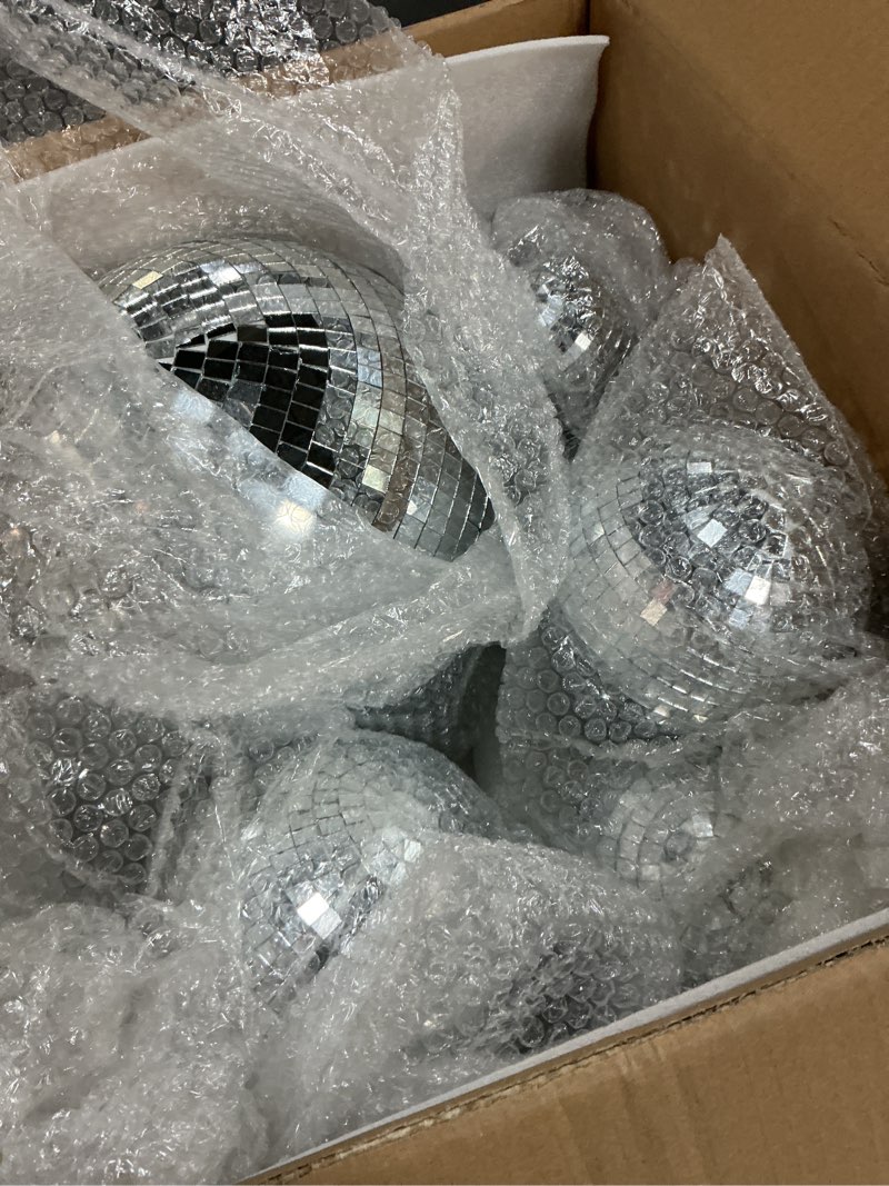 Condition photo showing Good Condition for Haull 8 Pcs Large Disco Ball Set Silver Mirror Disco Reflective Ball with Hanging Ring Party Ornament Decoration for Stage Club Ballroom Dance Hall Wedding Prom Props(12'', 8'', 6'', 4'')