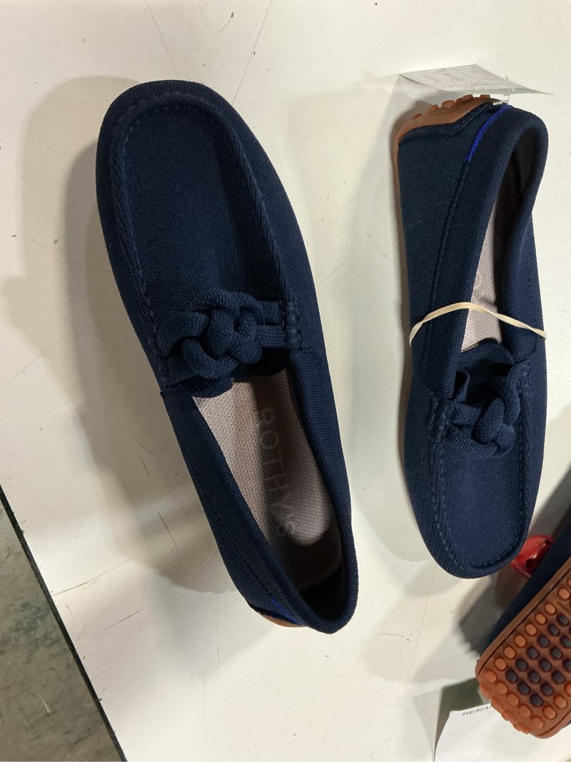 Condition photo showing Good Condition for rothys navy gum shoe loafer size 8.5