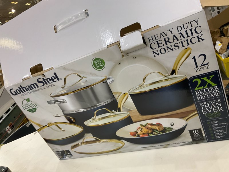 Condition photo showing Good Condition for Gotham Steel 12 Pc Ceramic Cookware Set Nonstick, Ceramic Pots and Pans Set Non Stick with Steamer for Cooking, Non Toxic PFOA PFOS Free, Premium Stay Cool Handles, Oven & Dishwasher Safe Navy Gold 12 Pc Set