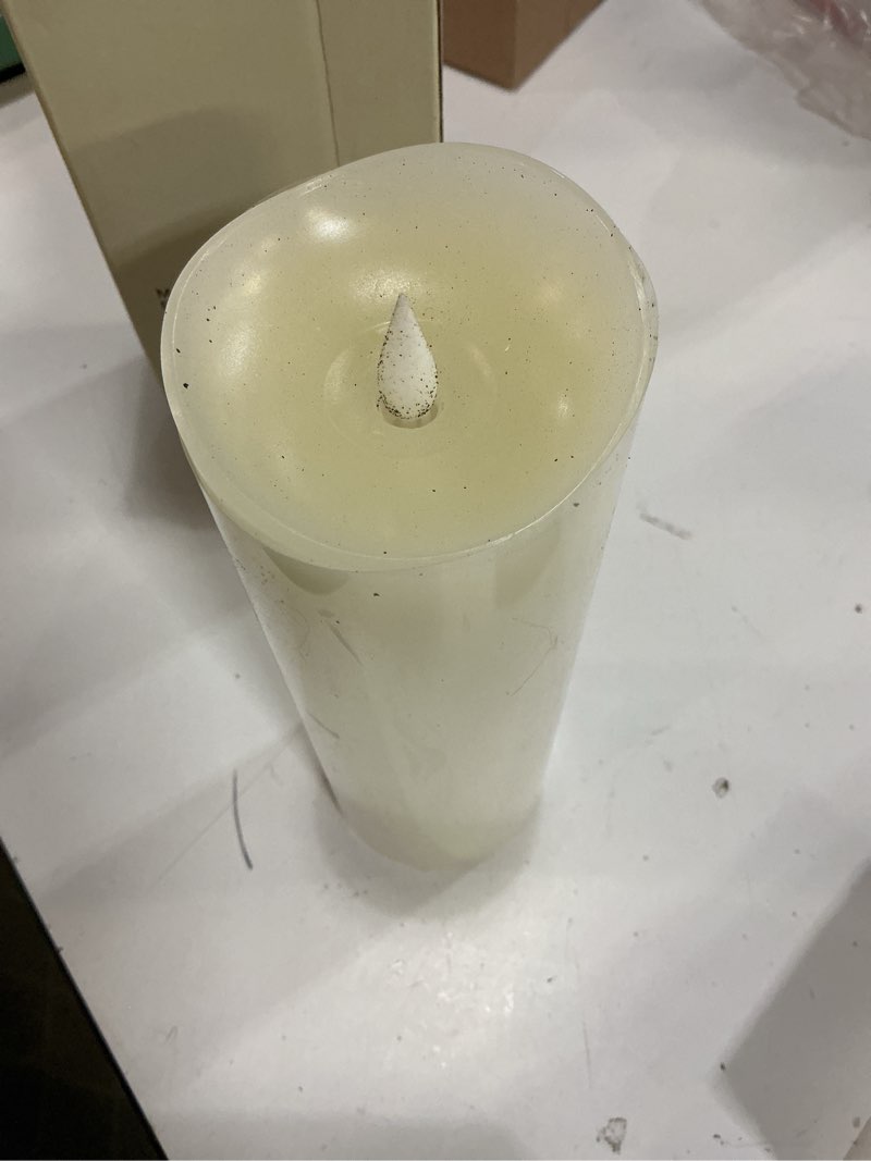 Condition photo showing Good Condition for flameless candle set- 2.25"x 4.2"white set of 2 - flickering moving flame pillar candle, includes remote control - real wax - 2 x aa battery operated - not included white 2.25"x4.2"