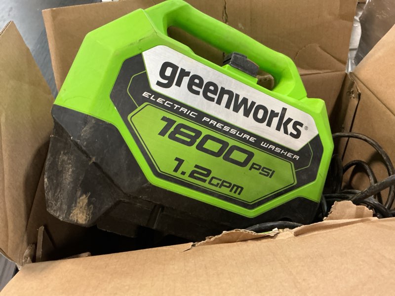 Condition photo showing As Is for greenworks 1800 psi 1.2-gpm cold water electric pressure washer with 2 spray tips