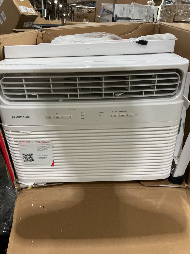 Condition photo showing As Is for frigidaire 8,000 btu window air conditioner with supplemental heat, cools & heats up to 350 sq. ft., remote control, quiet operation, eco mode, 3 fan speeds, white 1 count (pack of 1)
