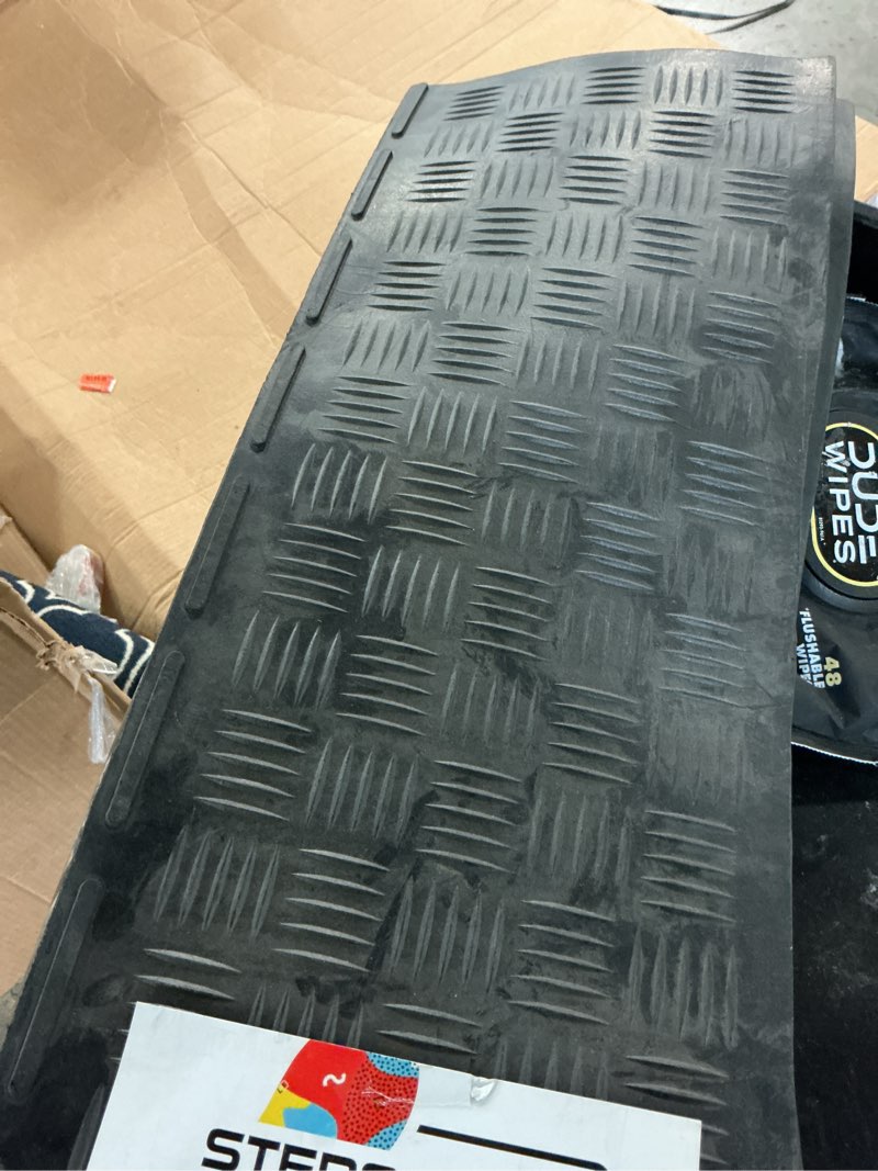 Condition photo showing As Is for black 9 in. x 24 in. rubber square stair tread cover