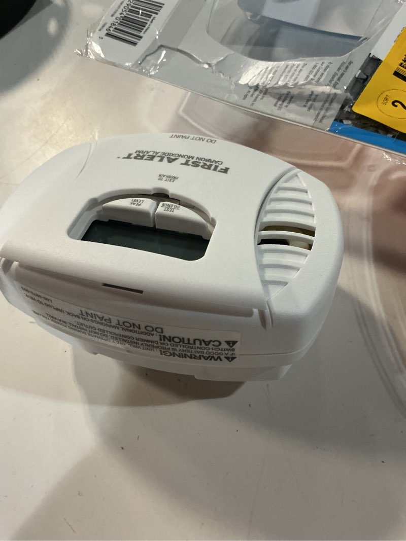 Condition photo showing As Is for first alert plug-in w/battery back-up electrochemical carbon monoxide detector