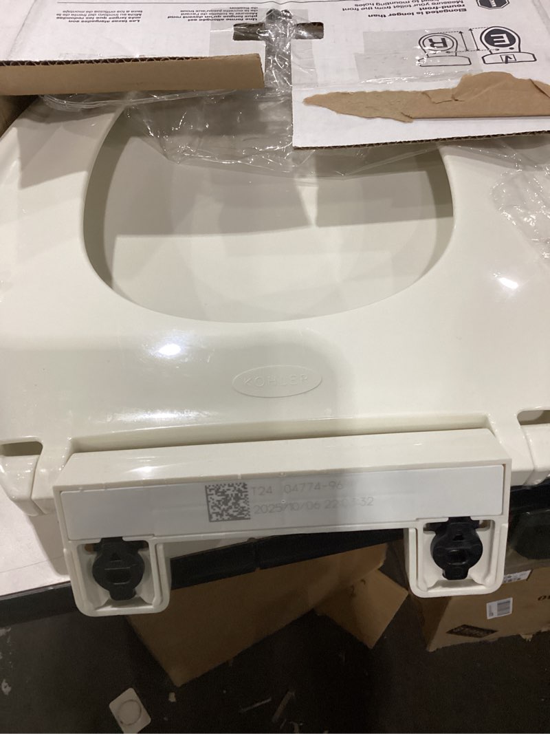 Condition photo showing As Is for kohler k-4774-96 brevia elongated toilet seat with quick-release hinges and quick-attach hardware for easy clean, biscuit elongated biscuit
