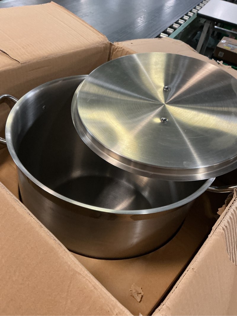 Condition photo showing As Is for nutrichef stainless steel cookware stockpot, 35 quart heavy duty induction soup pot with stainless steel lid and strong riveted handles, even heat distribution, compatible with most cooktops 35 quarts