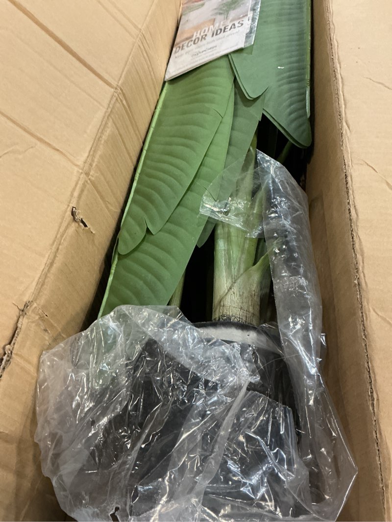 Condition photo showing Good Condition for lifelike bird of paradise artificial plant 6ft faux banana leaf tree with black tall wavy-textured planter for home decor - perfect indoor silk floor plant for living room office ambiance enhancement black wavy-textured planter 6ft