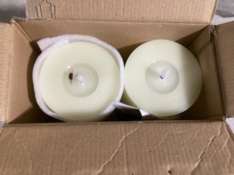 Condition photo showing Good Condition for flameless flickering 4" x6" real wax ivory remote candles with candle grease, pack of 2 timer led battery operated fake warm light pillar candles for home, banquet, ceremony decoration ivory 4" x6"