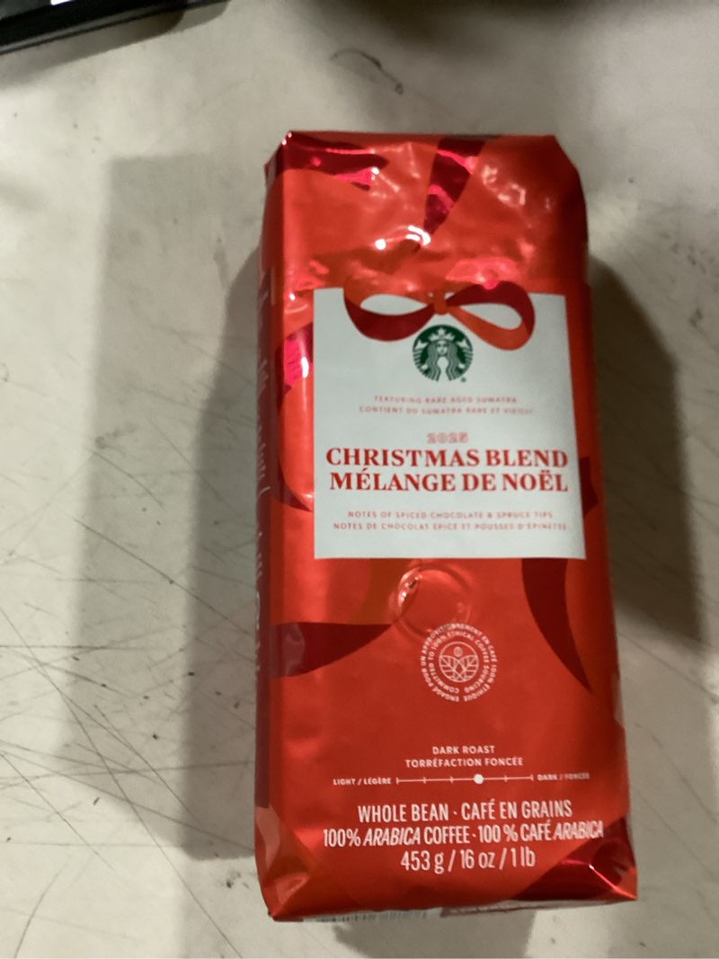 Condition photo showing New/Like New for starbucks christmas blend whole bean coffee 16oz, dark roast 100% arabica, rich spiced chocolate & spruce notes, limited holiday edition, bold, festive flavor from sumatra & latin america