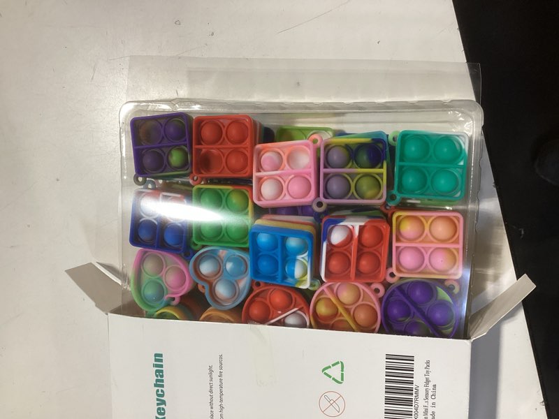 Condition photo showing Good Condition for onkull pop fidget keychain 90 pack ,mini fidget toys bulk ,sensory toys for kids ,party favors for kids 4-8,8-12 year ,back to school gifts for classroom ,easter goodie bags stuffers