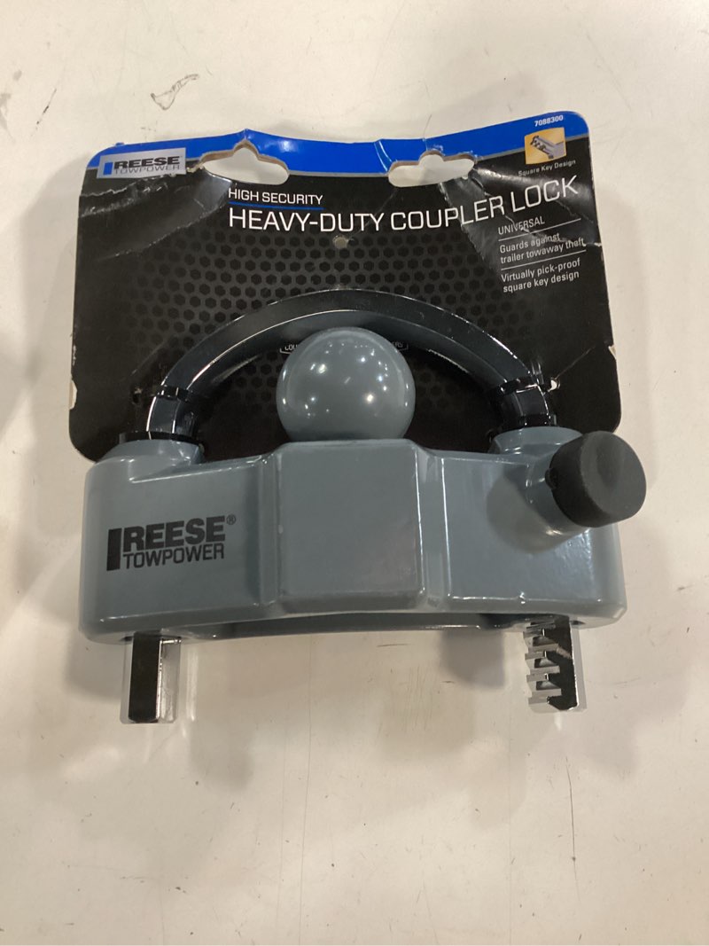 Condition photo showing New/Like New for reese towpower 7088300 trailer coupler lock, universal fit, heavy duty, designed to fit 1-7/8-in, 2-in, and 2-5/16-in couplers.
