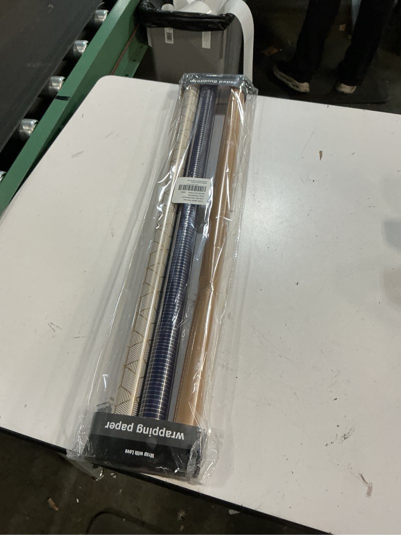 Condition photo showing New/Like New for wrapaholic 30 inch navy wrapping paper - jumbo roll gold and navy print with cut lines for christmas, birthday, holiday, father's day, baby shower - 4 rolls - 30 inch x 120 inch per roll navy & gold - 4 rolls