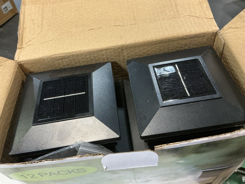 Condition photo showing As Is for solar post cap lights 12 pack, fence post solar lights, warm white/cool white lighting, black waterproof outdoor post lights for garden patio porch, 4x4, 5x5 or 6x6 vinyl/wooden posts