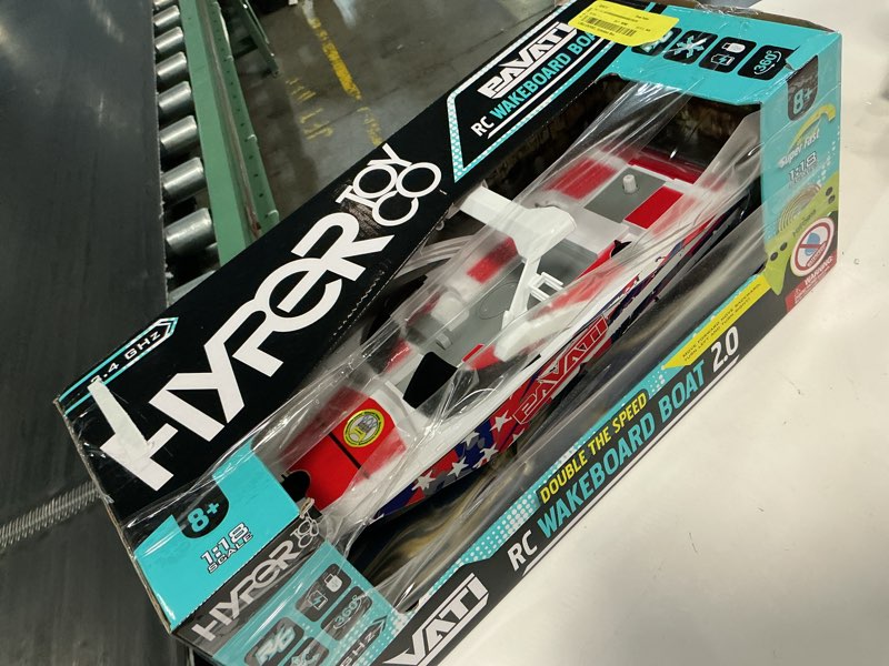 Condition photo showing As Is for hyper toy company, pavati 2.0 rc wakeboard boat, 1:18 scale with remote and battery, stars/stripes