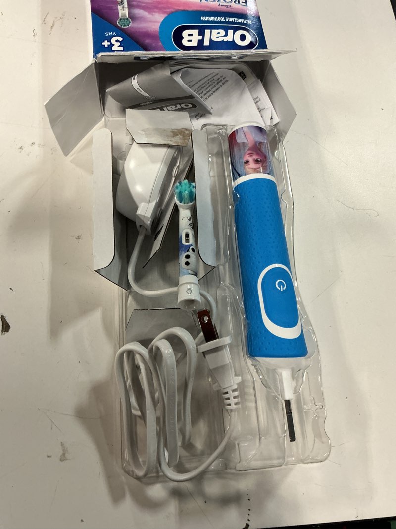 Condition photo showing As Is for oral-b kids electric toothbrush featuring disney's frozen for kids 3+ blue 1 count (pack of 1)