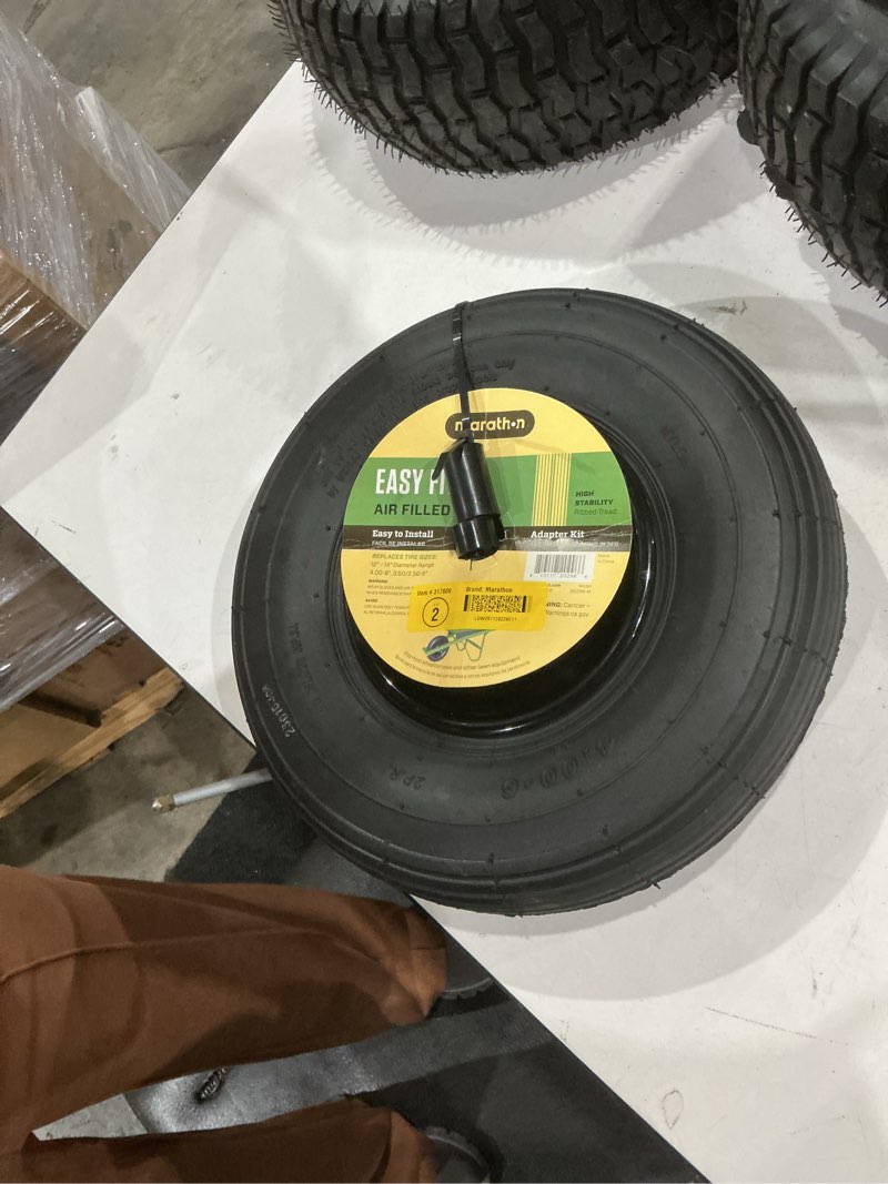 Condition photo showing Good Condition for 13 in. pneumatic universal wheelbarrow wheels