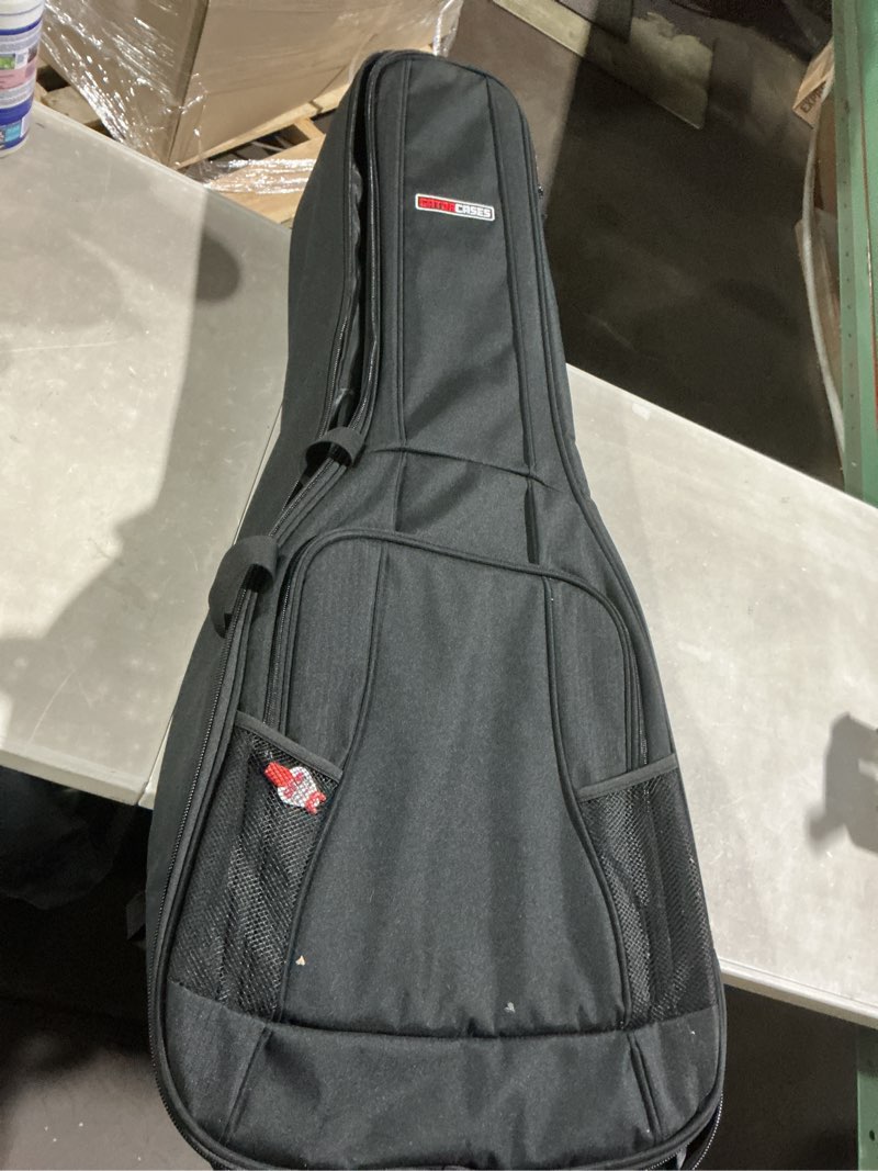 Condition photo showing Good Condition for gator cases 4g series gig bag for two electric guitars with adjustable backpack straps; fits two stratocaster and telecaster style electric guitars (gb-4g-elec 2x),black dual electric