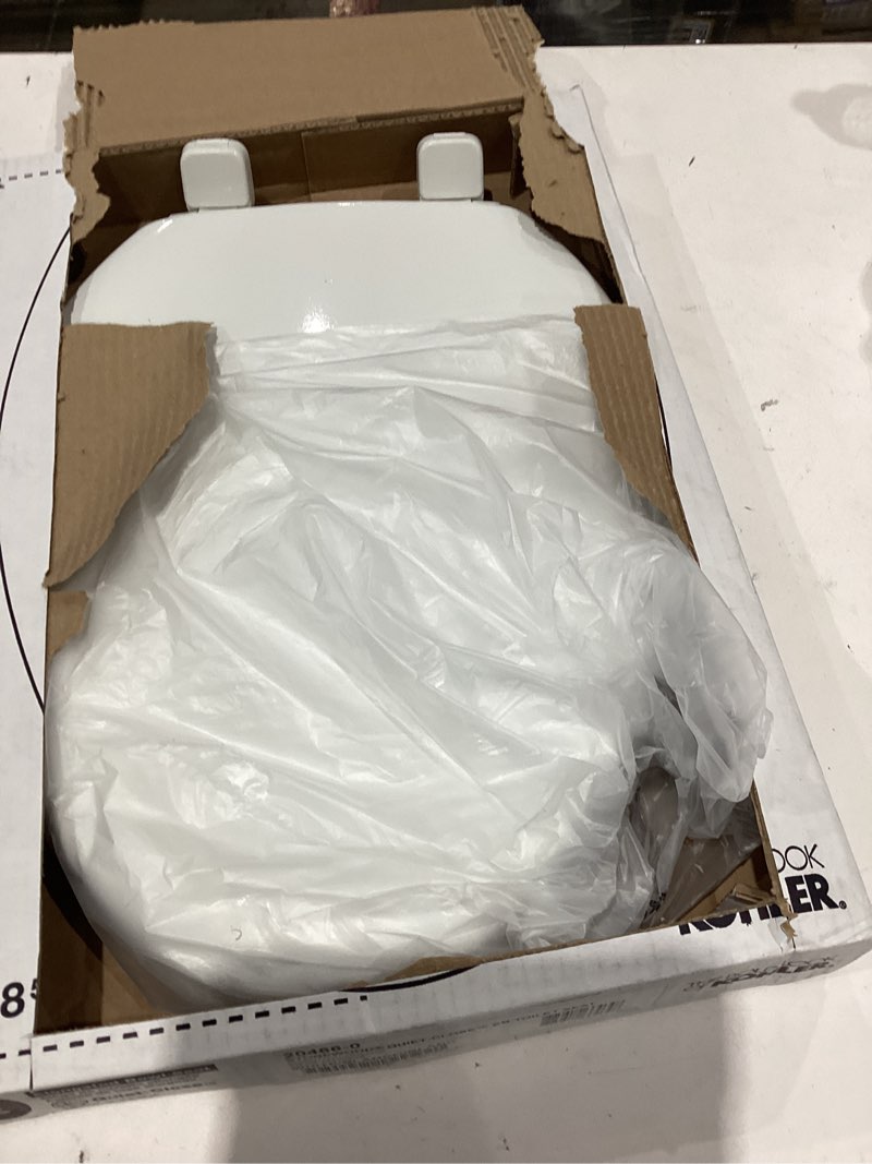 Condition photo showing As Is for kohler stonewood quiet-close, elongated toilet seat soft close, durable wood, easy installation, universal fit, home essentials, white finish, k-20466-0 white elongated double-hinge