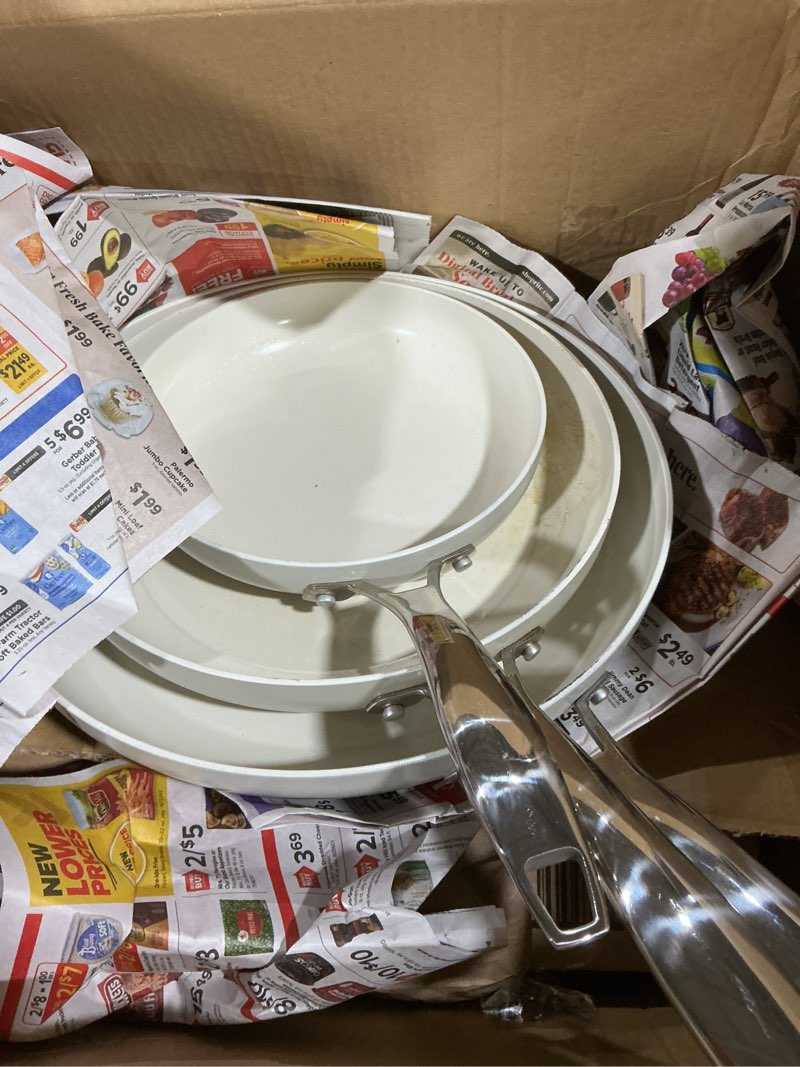 Condition photo showing Good Condition for amazon basics ceramic nonstick cookware, 3-piece set of frying pans, all cooktop induction compatible, dishwasher-safe, oven-safe, linen gray