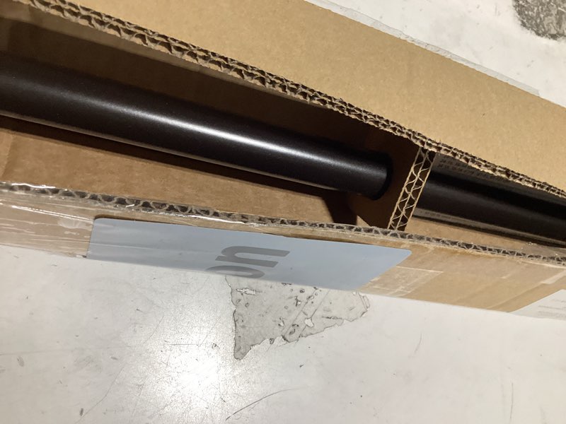Condition photo showing Good Condition for amazon basics no drill spring tension curtain rod, adjustable 36-54" width, bronze, classic finial bronze 36-54" indoor