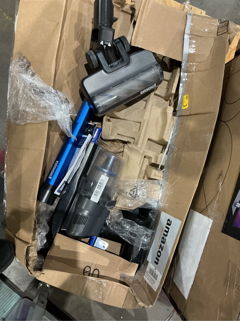 Condition photo showing As Is for bissell powerclean furfinder 200w self-standing cordless vacuum w/tangle free brush roll, strong suction, removeable battery, wall mount, upholstery tool & bright headlights