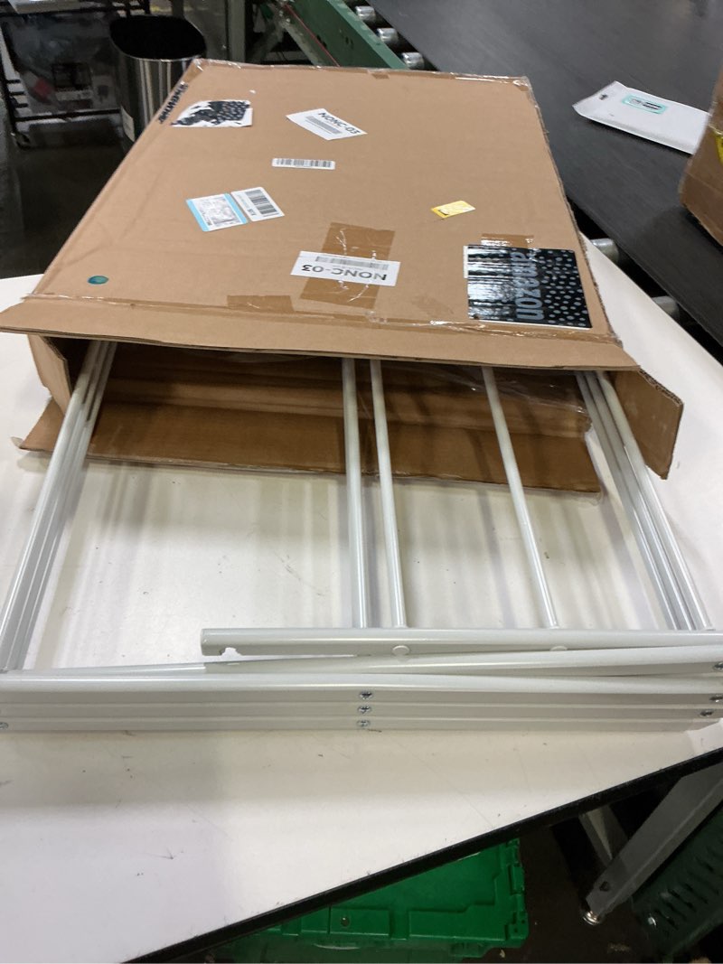 Condition photo showing Good Condition for amazon basics foldable portable clothes drying rack for indoor air drying, collapsible design, 14.5" d x 29.5" w x 41.8" h, white