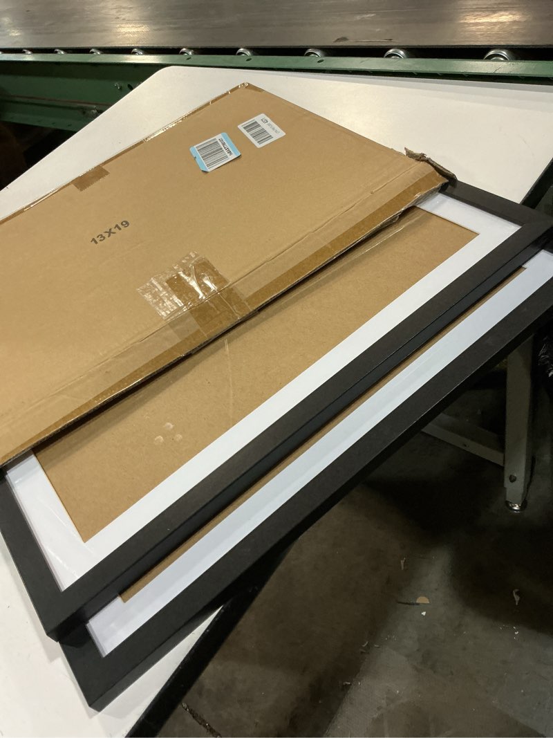 Condition photo showing Good Condition for pealsn 13x19 picture frame set of 2, display pictures 11 x 17 with mat or 13 x 19 without mat for wall mounting display, poster frames, black black 13x19