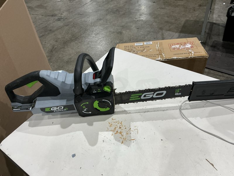 Condition photo showing As Is for ego power+ 56-volt 16-in battery 4 ah chainsaw battery included charger included