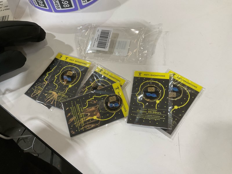 Condition photo showing As Is for IXULZ 6 Pcs Cell Phone Protection Stickers Neutralizers for Smartphones, Tablets, Laptops, Computers