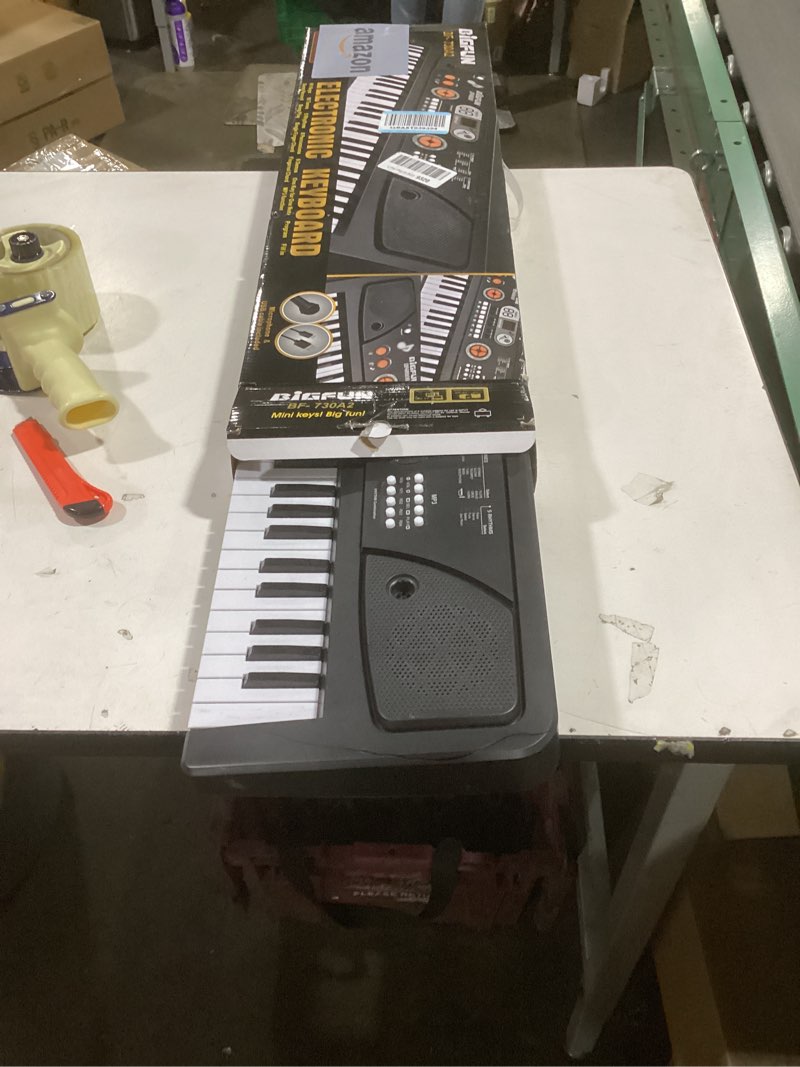 Condition photo showing New/Like New for 61 Key Upgrade Piano Keyboard for Kids Beginners Electronic Keyboards Pianos with LCD Screen Microphone Musical Instrument Toys for 3 4 5 6 7 8 Year Old Boys Girls Gifts