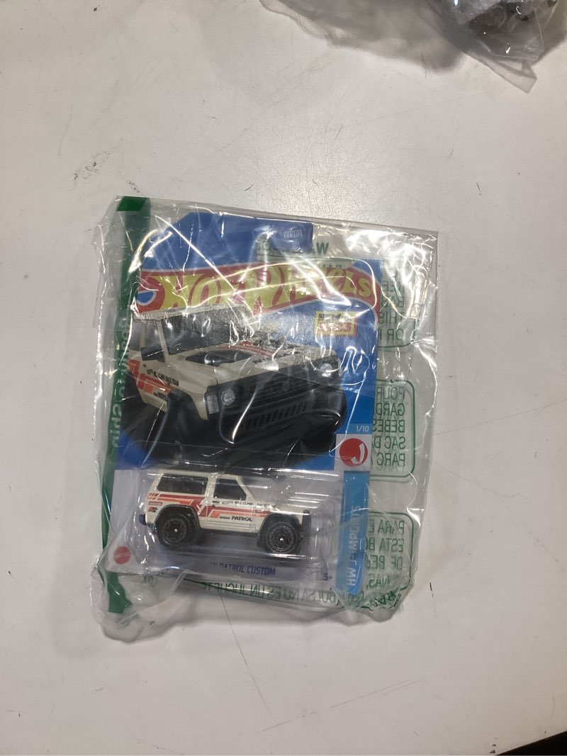Condition photo showing New/Like New for hot wheels nissan patrol custom, hw j-imports 1/10