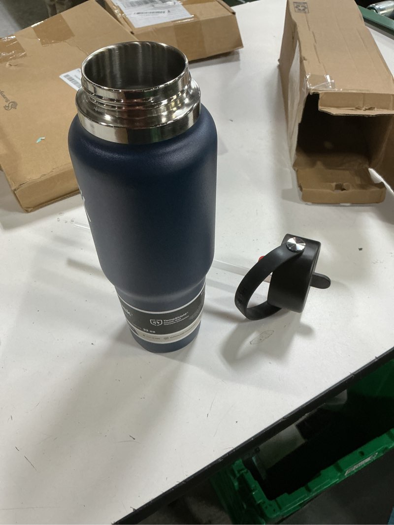 Condition photo showing New/Like New for hydro flask travel water bottle - insulated stainless steel - wide straw lid, non spill, leakproof in 32 oz indigo blue