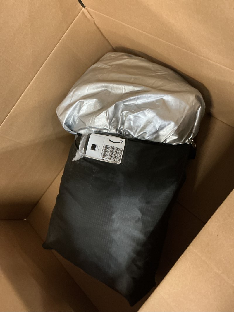 Condition photo showing As Is for Car/boat cover, size unknown 